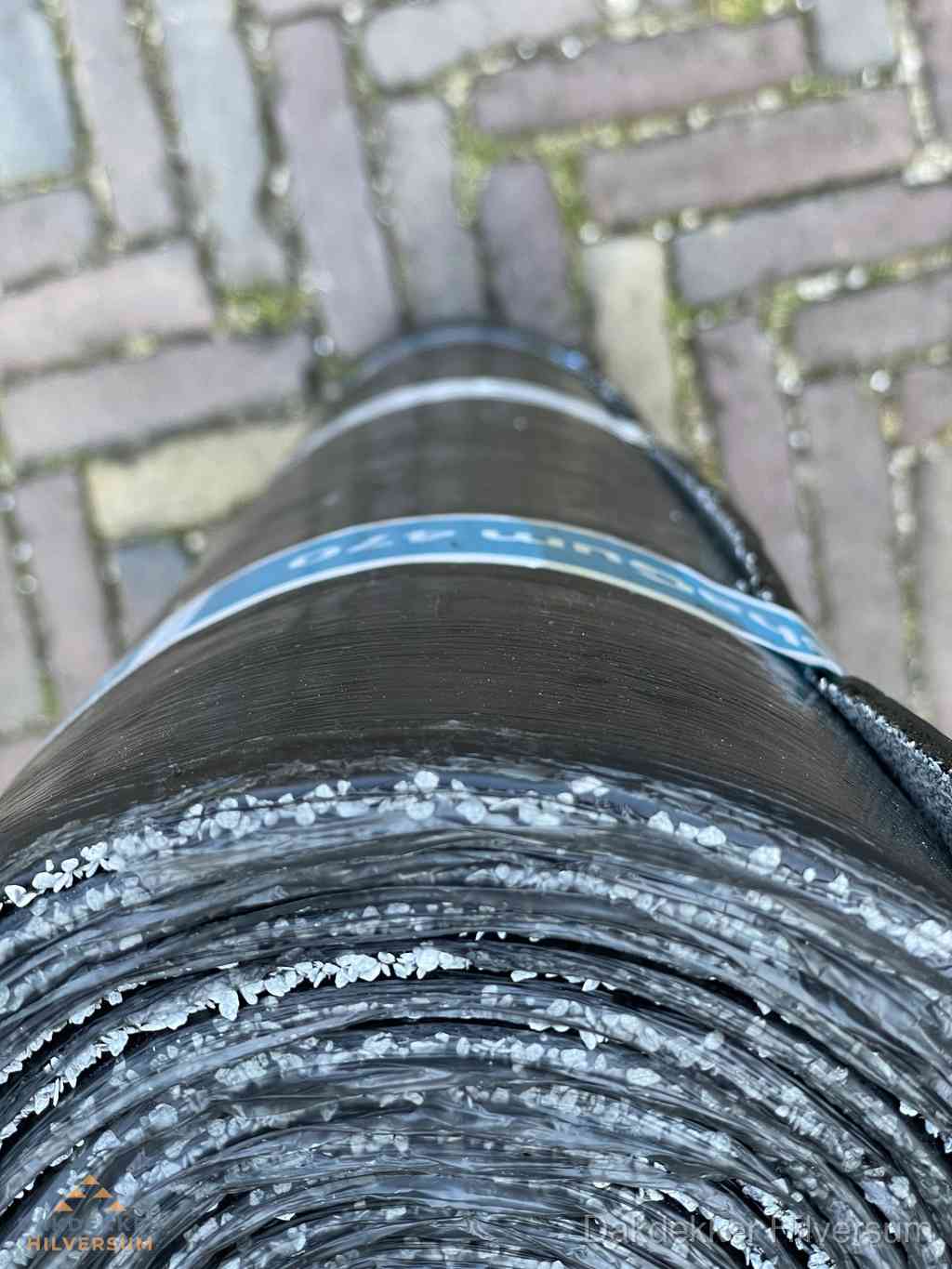 Rol bitumen dakleer met leislag voor plat dak in Hilversum